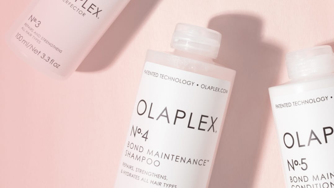 Olaplex Products 3, 4, 5 on a pink background